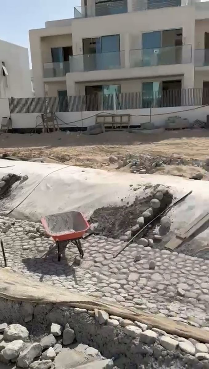 Najmat Al Faris crew installing geomembrane on a Dubai construction site